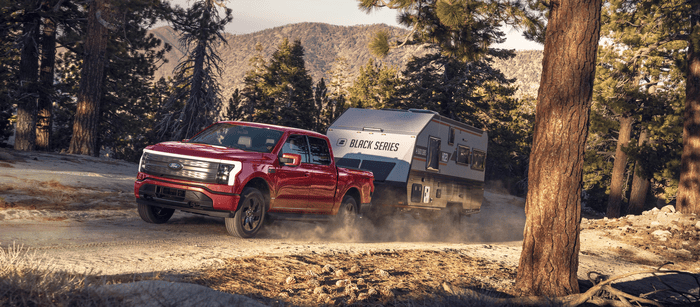 2025 Ford F-150 Lightning towing a trailer