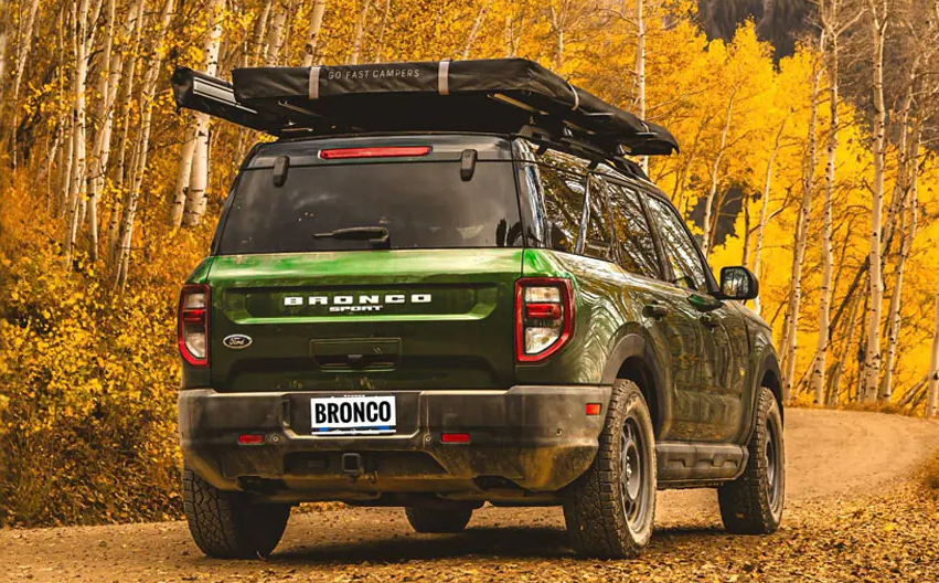 Green Ford Bronco Sport with a roof top tent