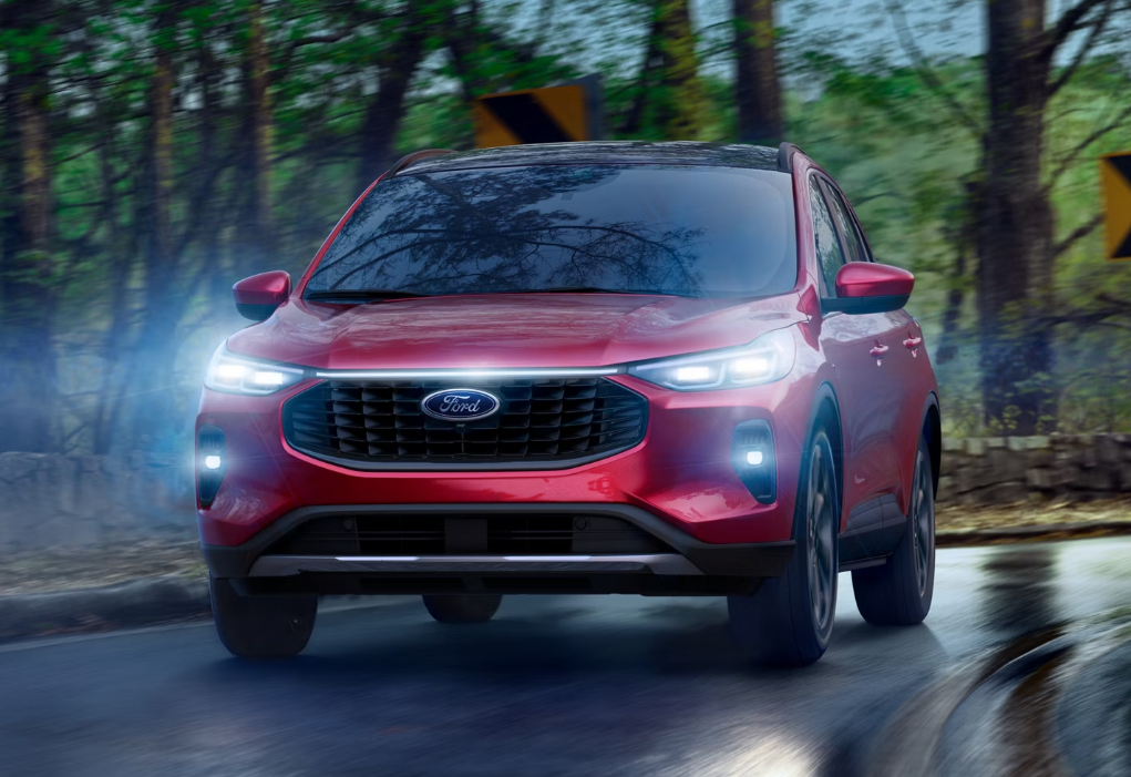 Red 2026 Ford Escape driving on the road in Jenkintown, PA