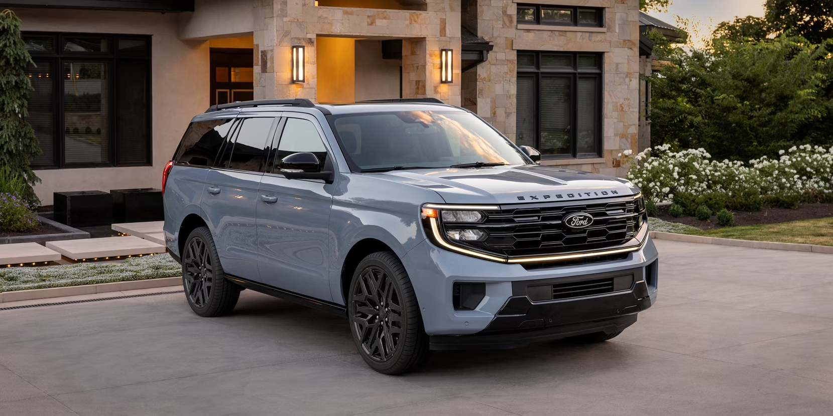 Blue 2026 Ford Expedition parked in driveway
